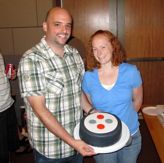 Aaron Foss And Keri Mahoney With A Twilio Cake At The New York ColdFusion User Group Presentation.