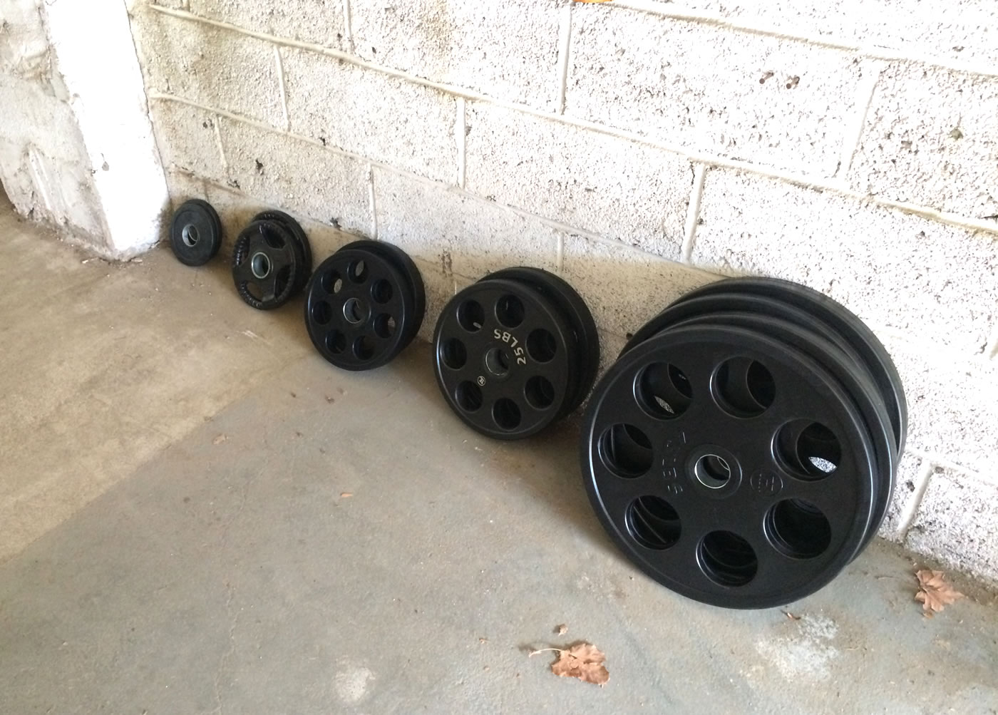 Building a home gym - hudson steel co, olympic weight plates with rubber coating.